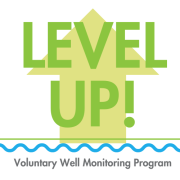 LEVEL UP! logo in Green with a yellow arrow pointing up in the background